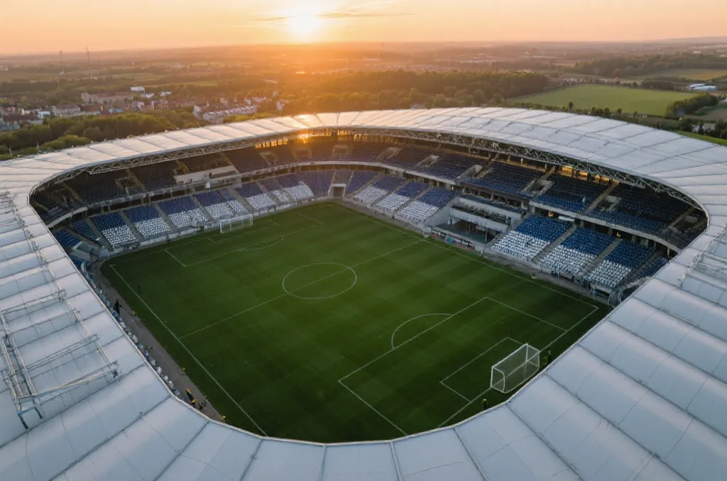 A beautiful generic soccer stadium at sunset with soft dramatic lighting